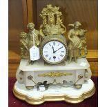 A gilt metal and alabaster mantel clock with French drum movement, pendulum and key, 31cm high and a