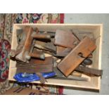 A collection of shipwright's woodworking tools, including moulding planes, Bailey 5½ shooting plane,