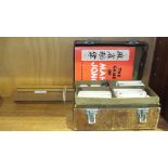 A bone and bamboo mahjong set in fitted case.