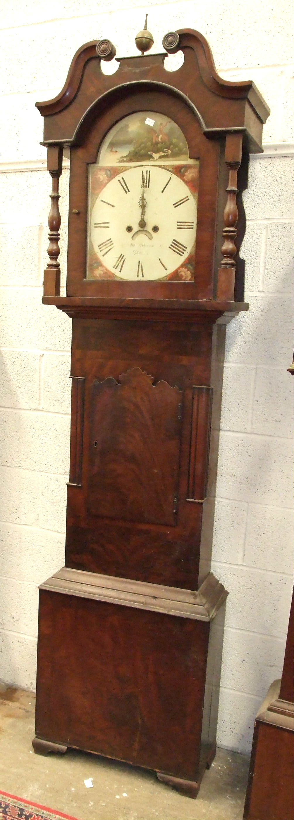 A 19th century mahogany North Country long case clock, the arched dial painted with stag hunting