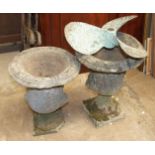 Two concrete garden urns, 50cm high, a bronze propeller and a small wooden rocking horse, (a/f), (