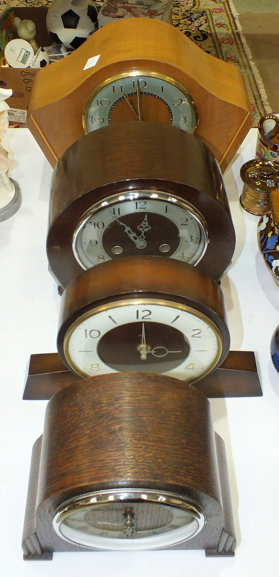 Four Smith's wood-cased mantel clocks, (4).