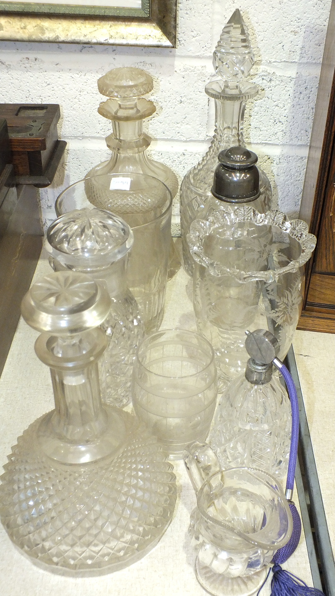 A glass celery vase with moulded rim and etched with ferns, 18cm high, a cut-glass cocktail shaker