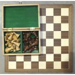 A similar modern Staunton-style chess set in fitted box and a modern chess board, 45cm square.