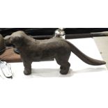 A cast iron nut cracker in the form of a dog, 30cm long and other items.