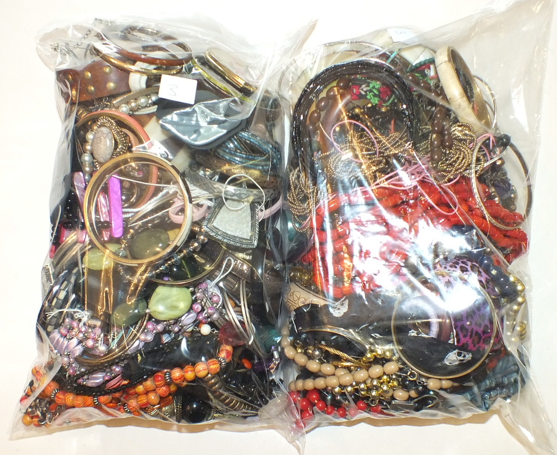 A quantity of costume jewellery, the contents of two bags. - Image 2 of 2