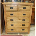 A modern oak chest of two short and four long drawers, 98cm wide, 120cm high.