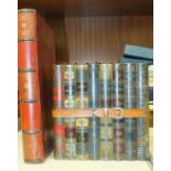 A Huntley & Palmers novelty biscuit tin in the form of bound books, 16cm, other advertising tins and