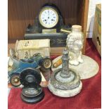 A late-Victorian marble case mantel clock with white enamel dial and bell-striking drum movement,