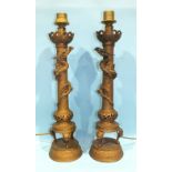 A pair of painted metal table lamps in the form of columns entwined with dragons, 55cm high, (2).