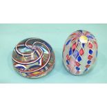 A modern St Louis glass paperweight of egg shape, with twists of tricolour, dated 1976, 7.5cm,