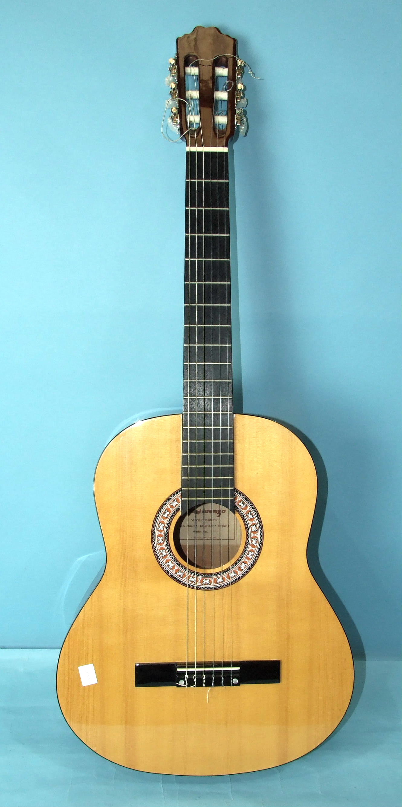 A Lorenzo Model 17/A six-string acoustic guitar in carrying case.