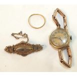 A 9ct gold brooch set diamond point, (a/f), a 9ct-gold-cased wrist watch on gold sprung bracelet and