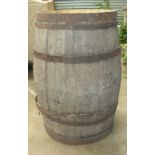 A large iron-bound coopered barrel, 95cm high, 64cm diameter.