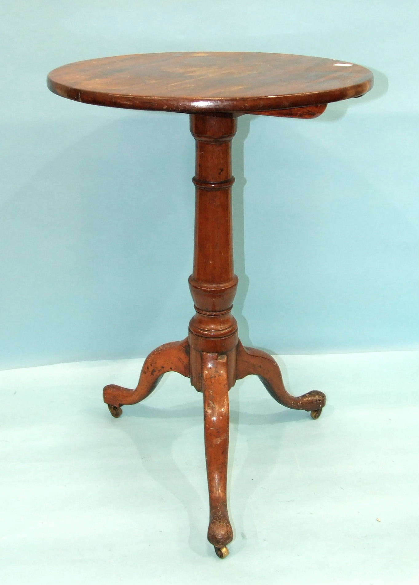 A 19th century mahogany circular tripod table, 49cm diameter, a spoon-back nursing chair, (damaged),