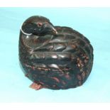 A lacquered wood box and cover in the form of a quail, 15cm high.