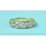 A five-stone diamond ring claw-set five brilliant-cut diamonds, totalling approximately 1.70cts,