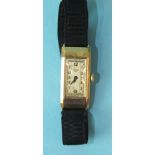 Tavannes, a ladies 9ct-gold-cased wrist watch c1940, the rectangular dial with Arabic numerals, on