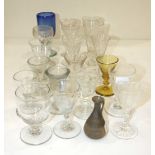 A large group of 18th and 19th century small wine glasses, including two toasting glasses, various