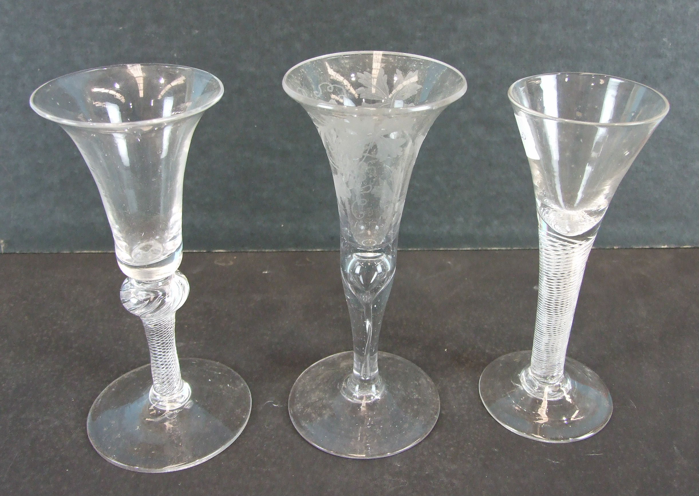 An 18th century English wine glass with trumpet bowl, on an air-twist stem, another with a knopped - Image 2 of 2