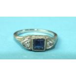 An 18ct white gold ring set a square-cut sapphire between two 8/8-cut diamonds, size N, 3.5g.