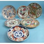 Two 18th century Chinese famille rose plates, a Chinese Imari saucer dish, two Canton plates and