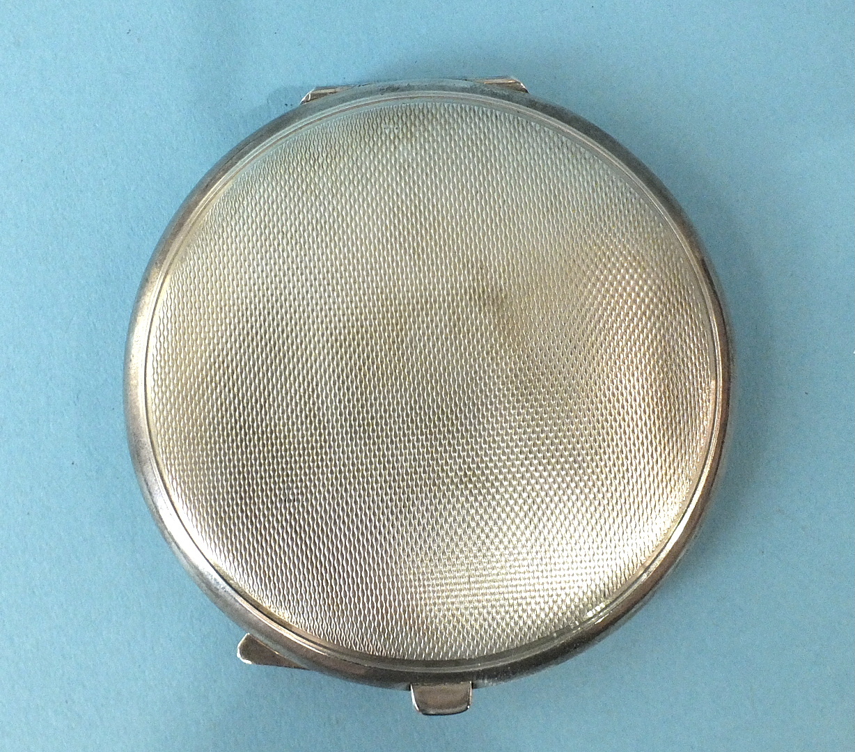 A circular silver powder compact, the blue guilloche lid enamelled in three panels, maker Turner & - Image 2 of 2