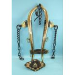 A pair of brass horse hames with leather end brasses attached, leather strap stamped 'S E Norris