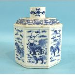 A 19th century Chinese six-sided caddy with panels decorated with Buddhist lions in clouds, 17.5cm