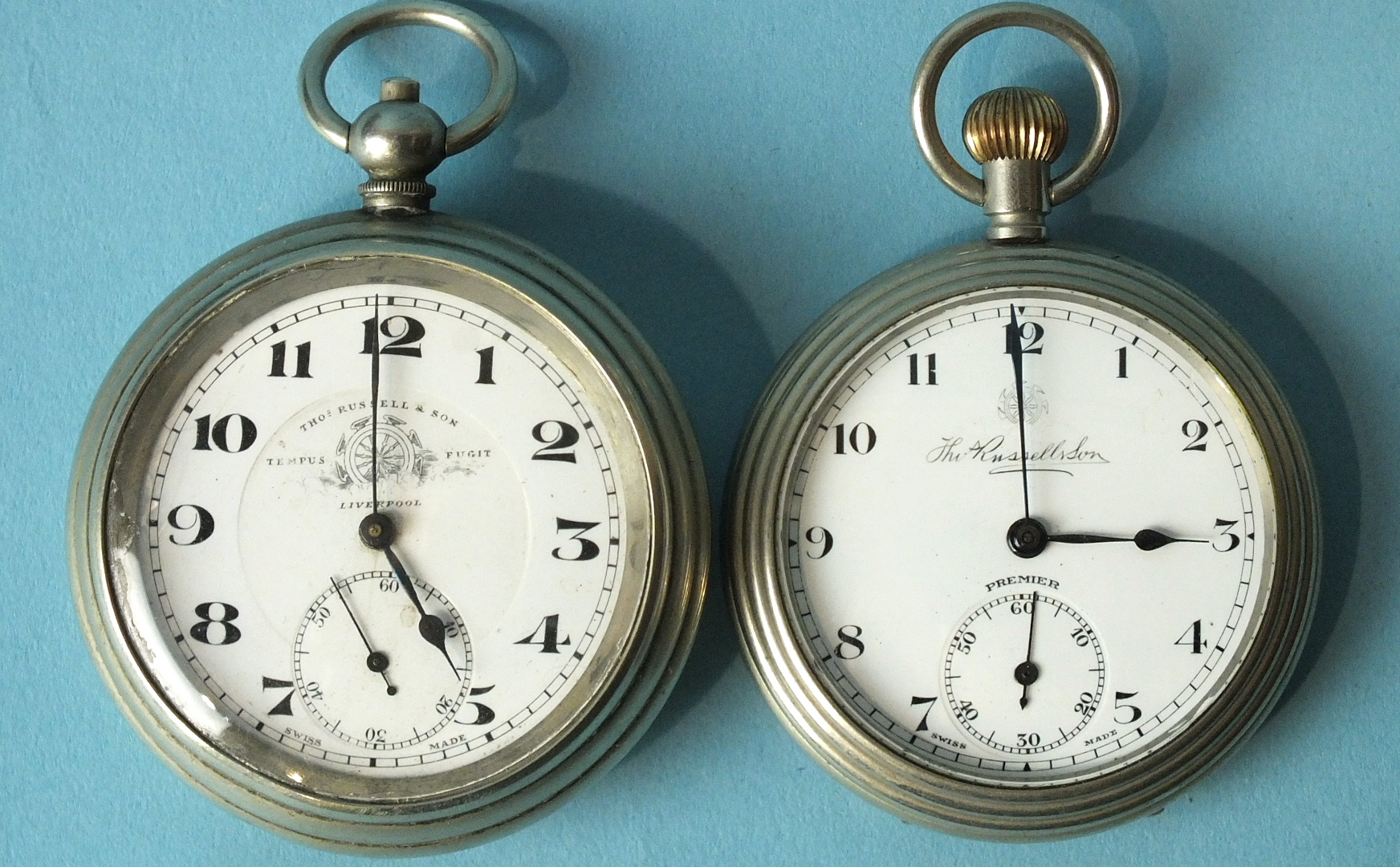 A Thomas Russell & Son keyless 'Premier' open-face pocket watch, 52mm and another, 'Tempus Fugit'