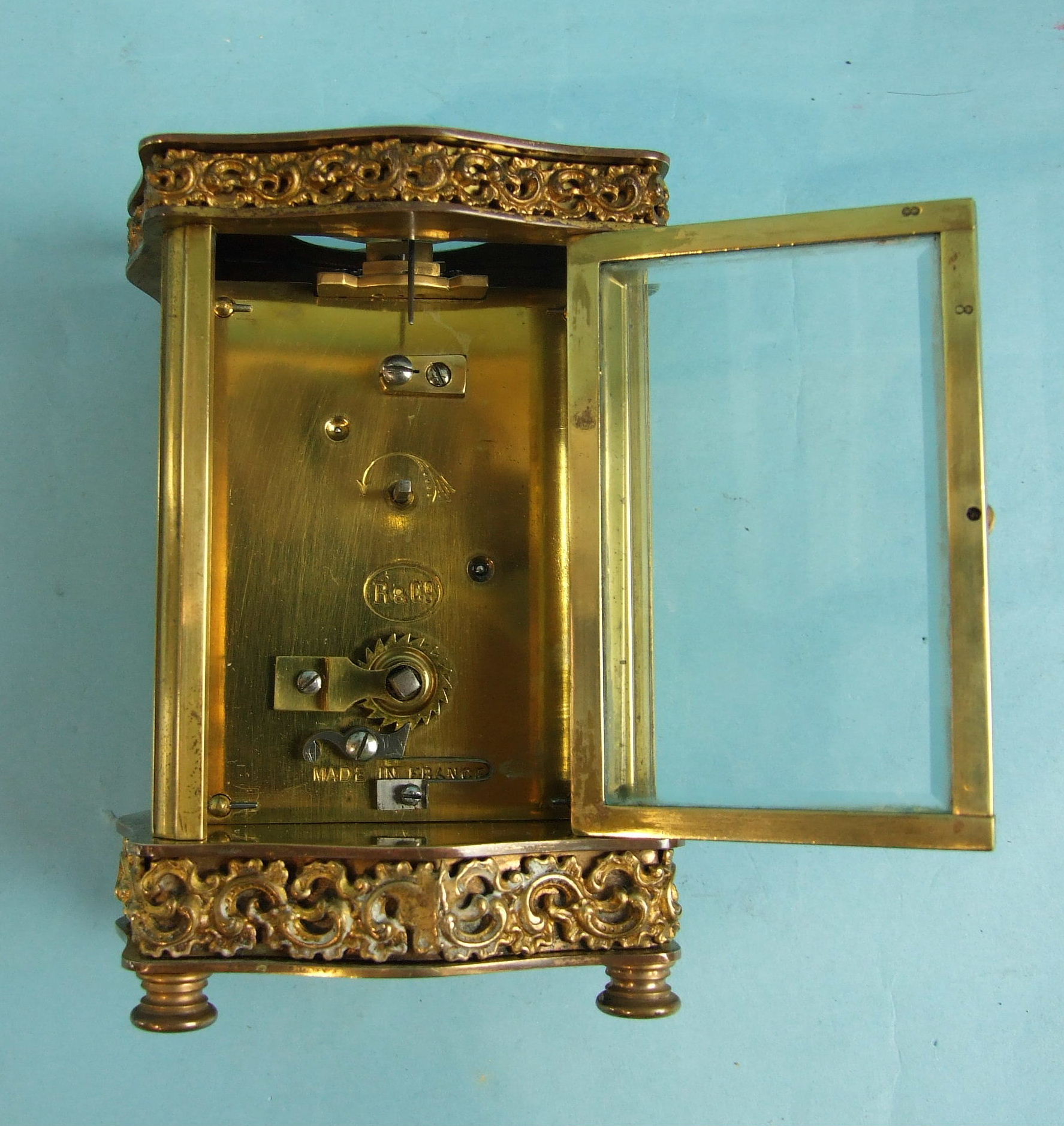 A French brass carriage timepiece, the case of serpentine outline, with decorative frieze and - Image 2 of 2