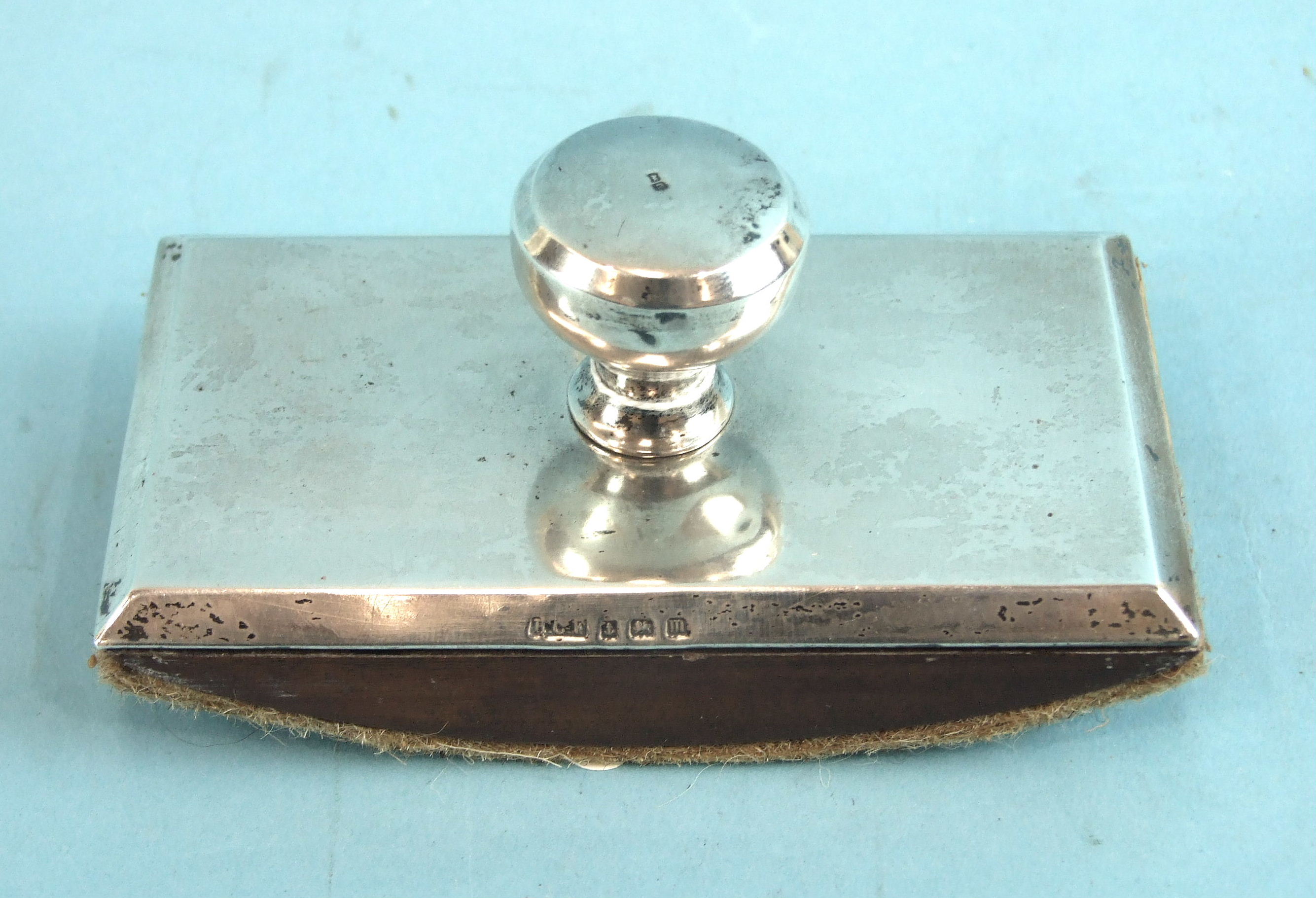 A plain silver-topped blotter, Birmingham 1911, maker Henry Freeman, 11.5 x 6cm.