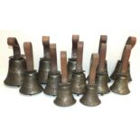 A 19th century set of twelve diatonic hand bells from 19F to C, initialled 'HS', possibly for