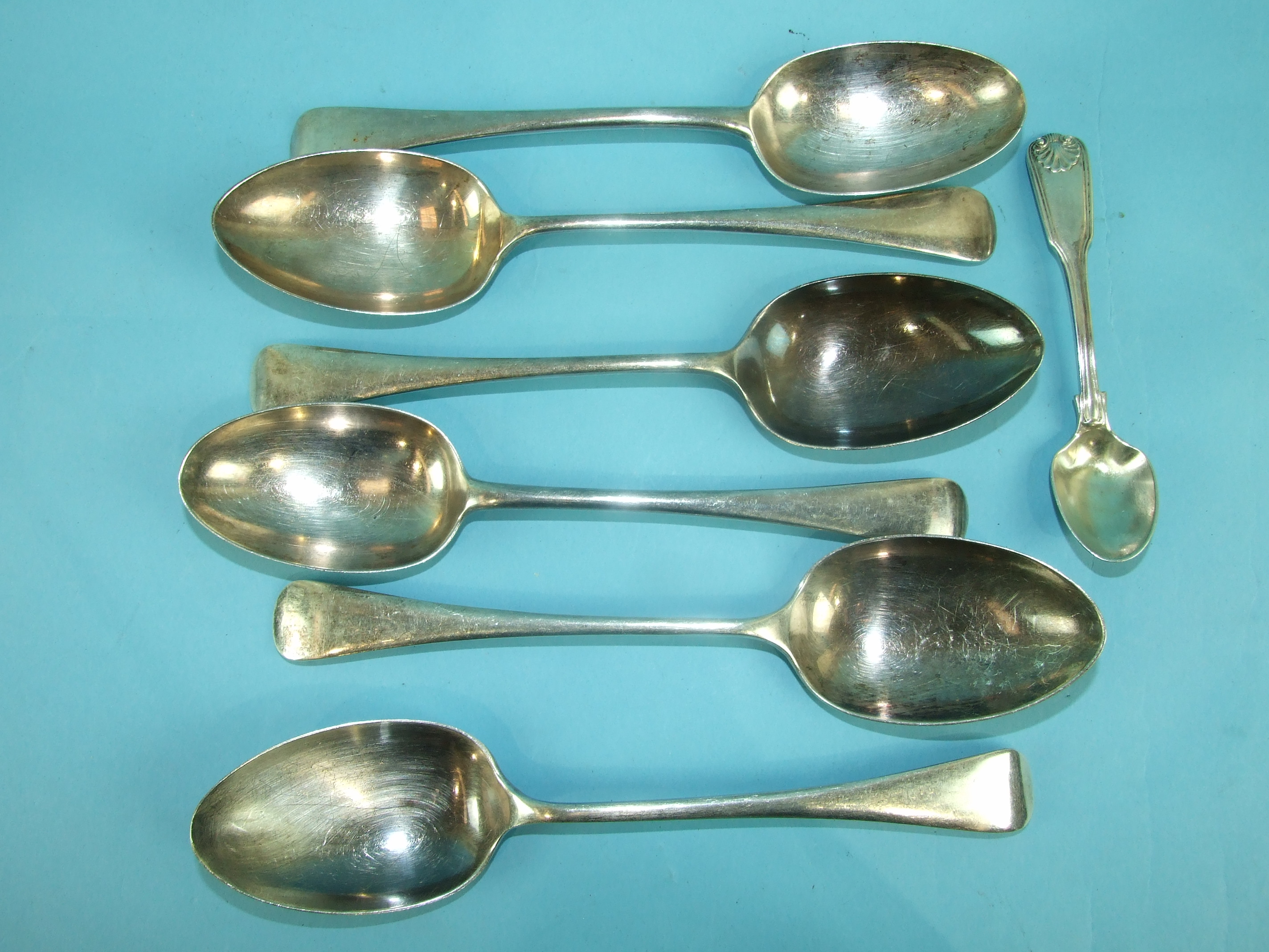 A collection of six silver Old English pattern tablespoons, 3x Sheffield 1933, 2x London 1915, 1x