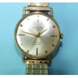 Rotary, a gent's 17-jewel Incabloc wrist watch with 9ct gold case, on plated flexible bracelet.