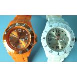 Two Ice Watches, one orange, one white, both dials with Arabic and dot numerals, seconds centre