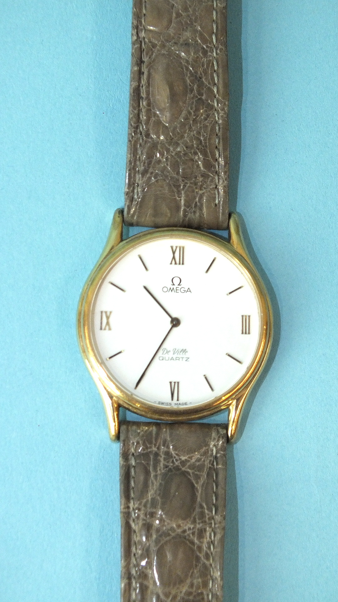 Omega, a gent's Omega De Ville Quartz wrist watch, the white dial, 33mm diameter, with Roman and