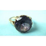 A gold ring set synthetic corundum, size N, 6.5g, (tests as 18ct gold approximately).