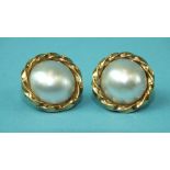 A pair of 9ct gold mabé pearl earrings, 18mm diameter, 8.1g.