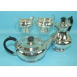 A four-piece Walker & Hall silver tea service with beaded rim decoration, comprising a teapot of