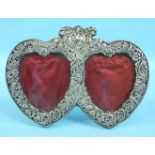 An attractive Victorian photograph frame in the form of a double-heart decorated with flowery