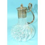 A Fabergé Russian silver-mounted glass jug, the hinged lid with cast foliate finial and double-