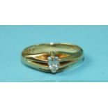 An 18ct gold ring set oval diamond, size R, 5.6g.