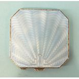 An octagonal silver powder compact by William Neale and Son Ltd, with pale blue guilloche-
