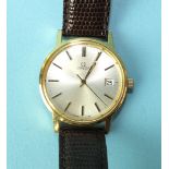 Omega, a gent's wrist watch, the silvered dial with baton numerals and date aperture, in gold-plated