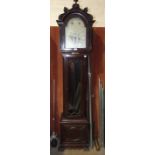 An early-20th century mahogany long case clock, the twin-train movement chiming on nine tubes, the