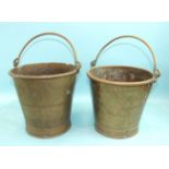 Two similar late-19th century brass coal buckets of slightly-tapered form, with multiple line