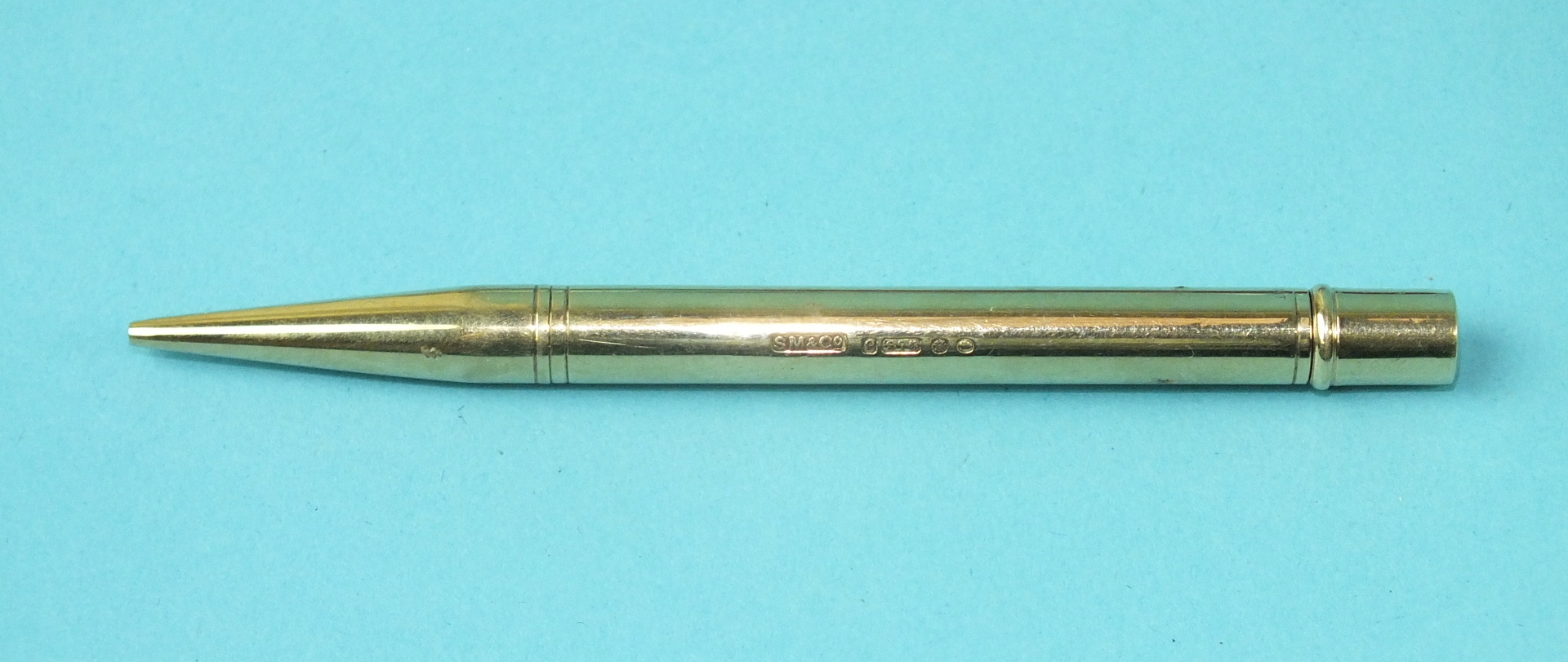 Sampson Mordan & Co, a 9ct gold propelling pencil, London 1928, 90mm, 15.7g.