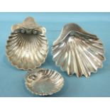 Two Edwardian silver scallop shell dishes, London 1902 and one small sterling silver shell dish, a