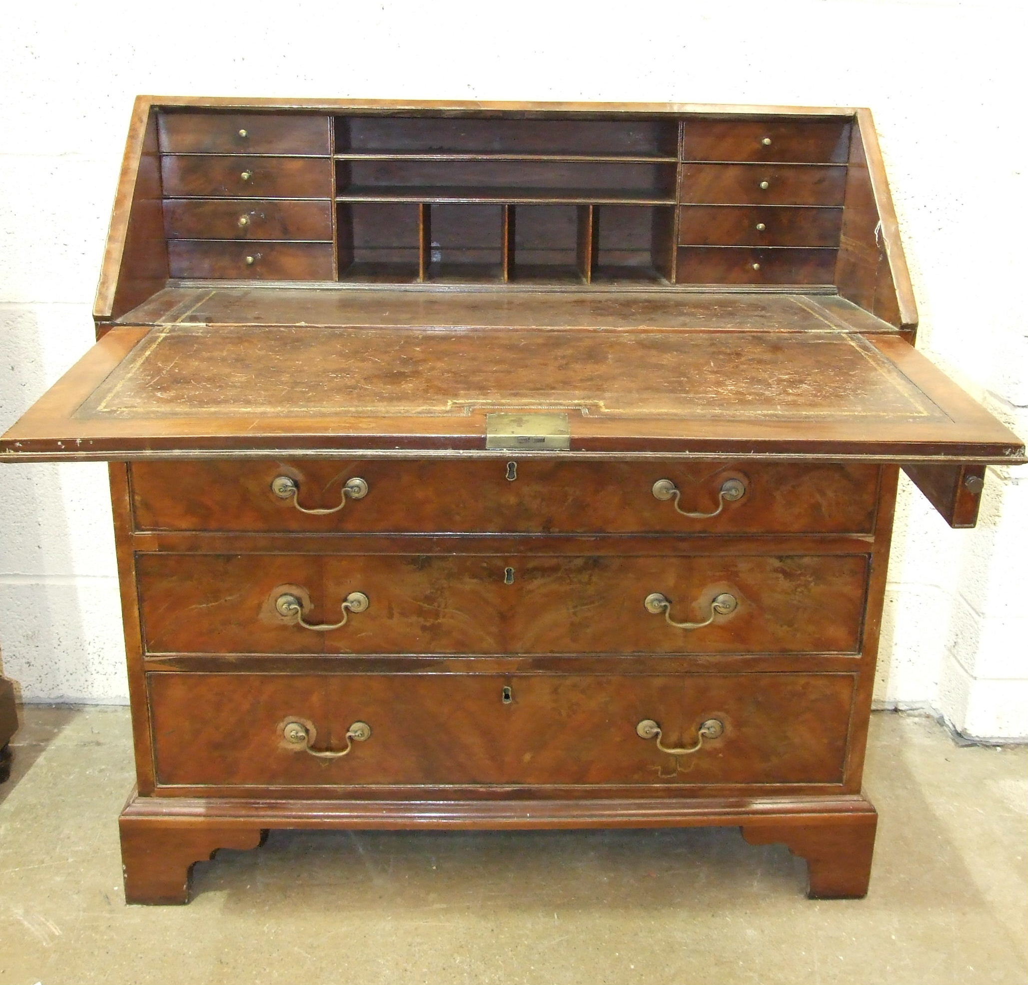 A George III mahogany bureau, the fall front with fitted interior, above four graduated cockbeaded - Image 2 of 2